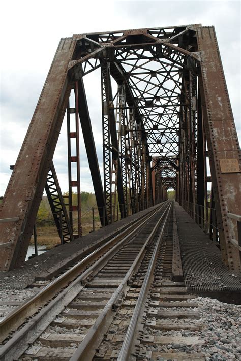 Old Train Track Crossing a Bridge