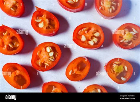Scene Of The Red Chili Which Looks Very Hot Against A White Background No People Stock Photo