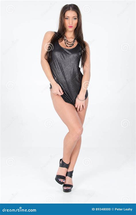 Brunette Haired Woman In A Black Tank Top Stock Photo Image Of Attractive Pose