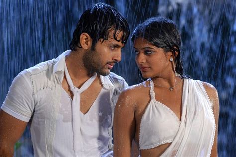 ThePhotoZone Priyamani Hot In Wet Saree Navel Show Photo