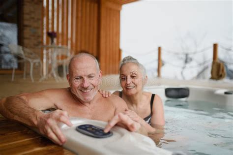 Romantic Wellness Getaway Senior Couple Enjoying Hot Tub During Valentine X27 S Weekend Stock