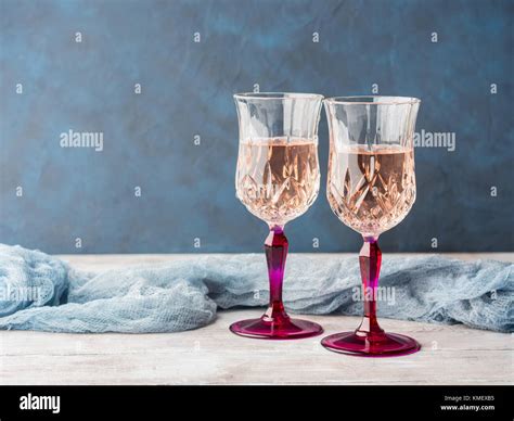 Two Stemmed Champagne Glasses On Wooden Textured Background Valentine S Day Wedding Romantic