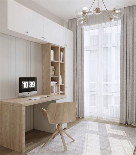 a room with a desk, chair and bookcase in the corner next to a window