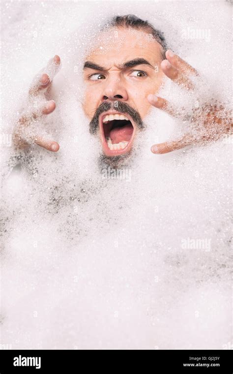 Man Covered In Soap Bubbles Men Covered In Soap Bubbles Hi Res Stock