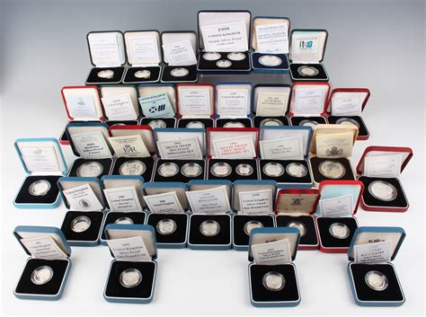 A large collection of Elizabeth II Royal Mint silver proof ...