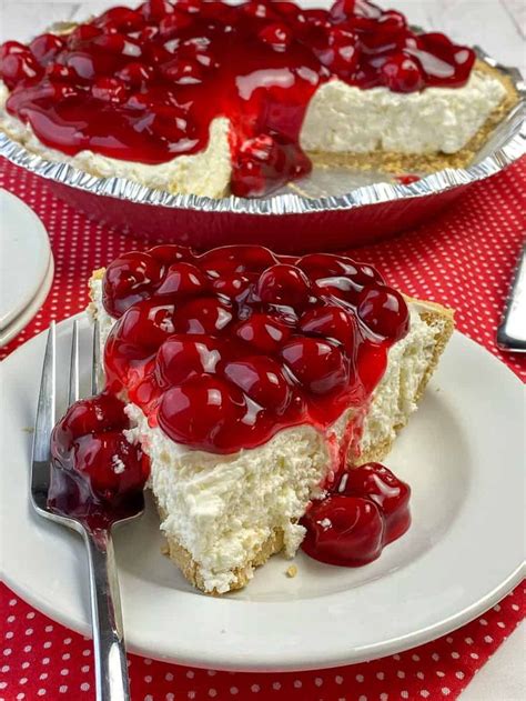 Slice Of Easy Cherry Cheesecake Pie Next To Entire Pie No Bake Cherry Cheesecake Cherry Pie