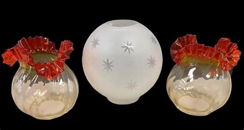 Lot - Lot of 3 vintage glass globes including a frosted glass “star ...