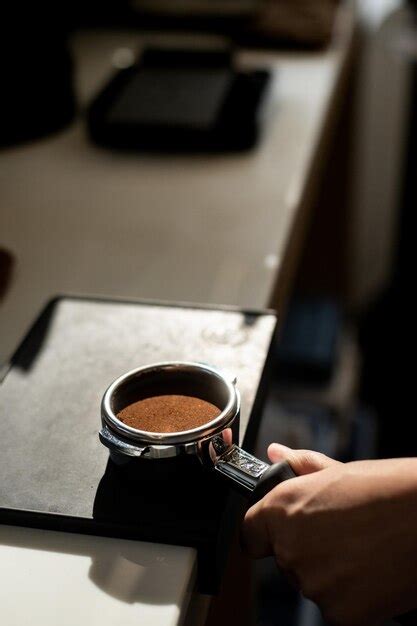 Premium Photo | Barista making coffee in coffee shop barista brewing coffee