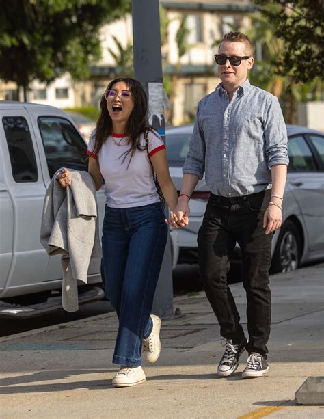 Macaulay Culkin and fiancee Brenda Song pack on the PDA during romantic ...