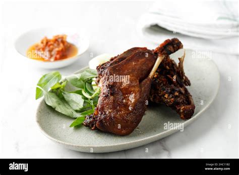 Bebek Goreng, Traditional Fried Duck Menu in Indonesian. Popular Menu came from Madura, East ...