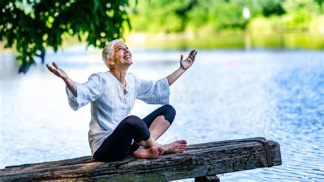Beautiful Mature Woman Enjoying Peace And Tranquility Of The Nature Stock Photo Image Of White