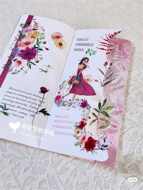 An Open Book With Floral Designs On It