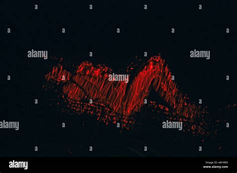 Feminine nude lit by a laser beam Nu féminin éclairé par un faisceau