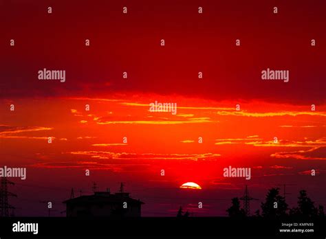 Sunset city background Stock Photo - Alamy