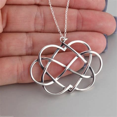 Two Hearts Intertwined Necklace