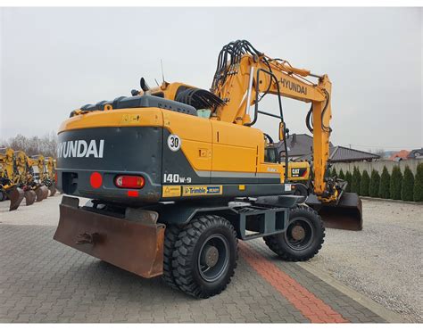 Hyundai R 140 W - Maszyny Budowlane Sprzedaż