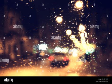 Driving at night in the rain Stock Photo - Alamy