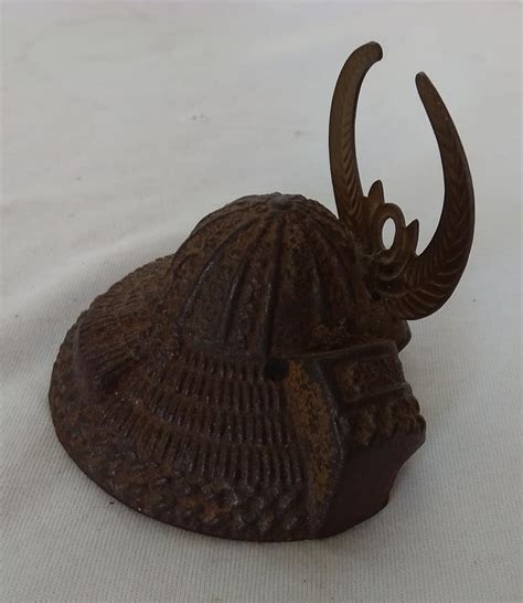 temuan galeri  ornamen topi besi prajurit besi terjual