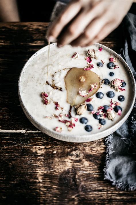 Creamy Chilled Porridge Topped With Chia Poached Pears And A Serious