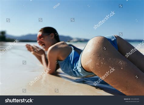 Woman Swimsuit Sunbathing On Beach Naked Foto Stock 1932285905 Shutterstock
