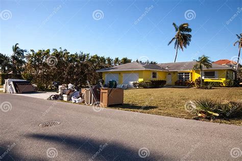 News â€ Debris Including Personal Items Alongside Flooded Homes After