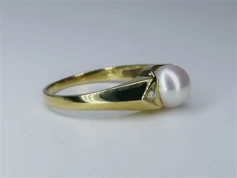 Ring In 333 Gelbgold Mit Perle Und Diamanten Art Nr J159