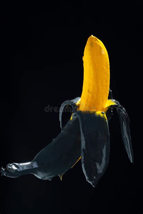 Banana Paint. Yellow-black Painted Banana on a Black Background ...