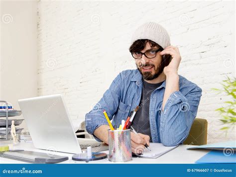 Hispanic Attractive Hipster Businessman Working At Home Office Talking