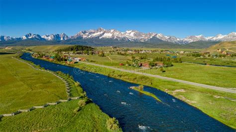 Salmon River Flows through a Small Mountain Town with Mountain Range ...