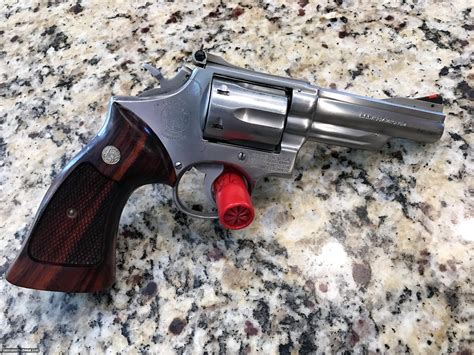 S&W MODEL 66 NO DASH, 4 IN, STAINLESS, 357 MAG, 2 SET FACT GRIPS, MFG ...