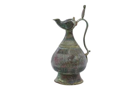 lot   engraved bronze ewer