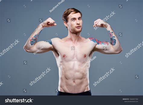 Man Muscular Naked Body Tattoos On Stock Photo 1364031764 Shutterstock