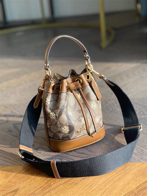 Coach Dempsey Drawstring Bucket Bag 15 In Signature Canvas With