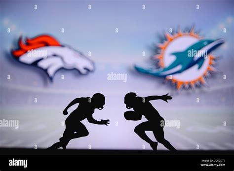 Denver Broncos vs. Miami Dolphins. NFL match poster. Two american ...