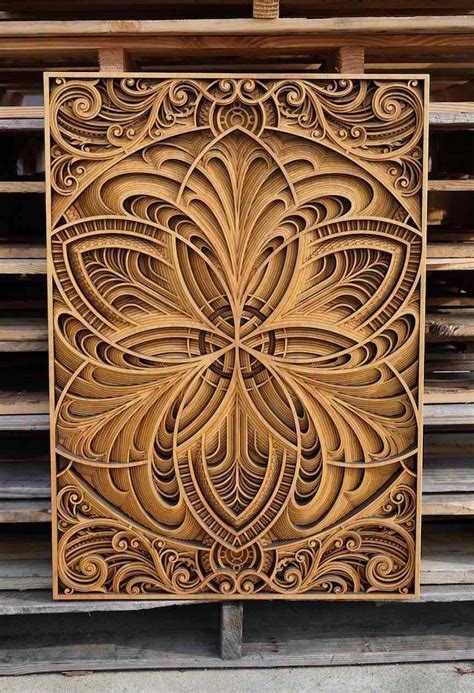 Intricate Laser-Cut Wood Artworks Offer Homage to Nature (Video)