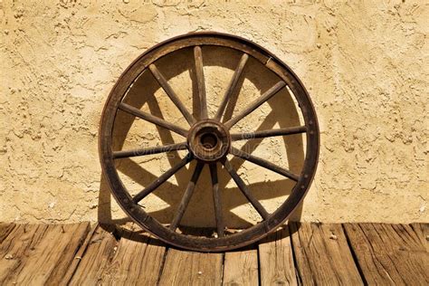 Wagon Wheel Of The Old West Stock Photo - Image of desert, american: 13463104