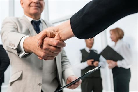 Premium Photo Businessman Confidently Shaking Hands With His Business