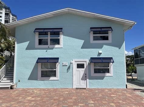 Deco Bahama Shutter Installation In Fort Myers Beach Fl Eurex Shutters