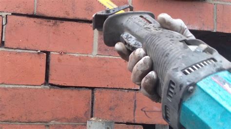 Reciprocating Saw With Dewalt Dt Blade Cutting Out Bricks Youtube