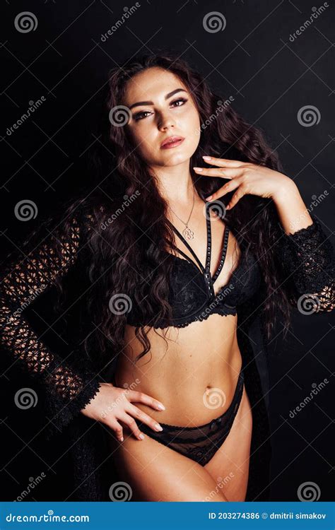 Portrait Of A Beautiful Fashionable Brunette Woman In Black Lingerie
