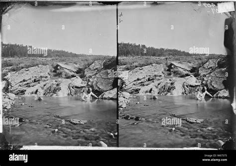 MAN BATHING IN HOT SPRING Stock Photo Alamy