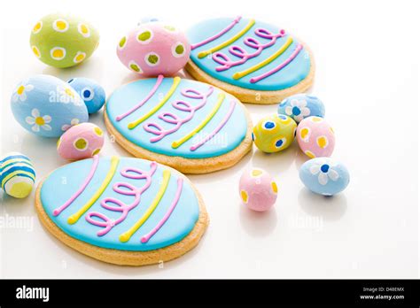 Easter cookies in shape of egg decorated with blue icing Stock Photo ...