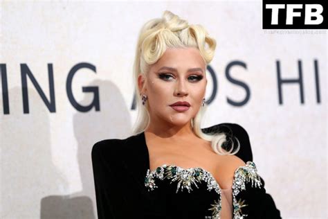 Christina Aguilera Displays Nice Cleavage At The AmfAR Gala Cannes 2022