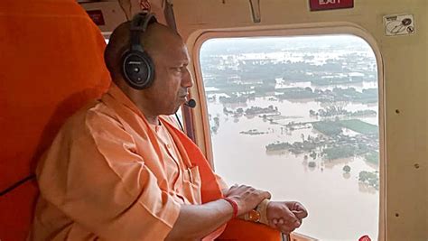 In Photos Yogi Adityanath Inspects Flood Affected Areas In Uttar Pradesh