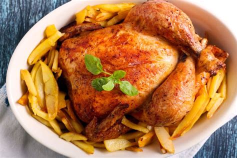 Roast Chicken And Potato Chips Stock Image Image Of Savory Brown