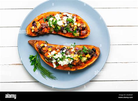 Sweet Potato Batata Roasted With Vegetables Stock Photo Alamy