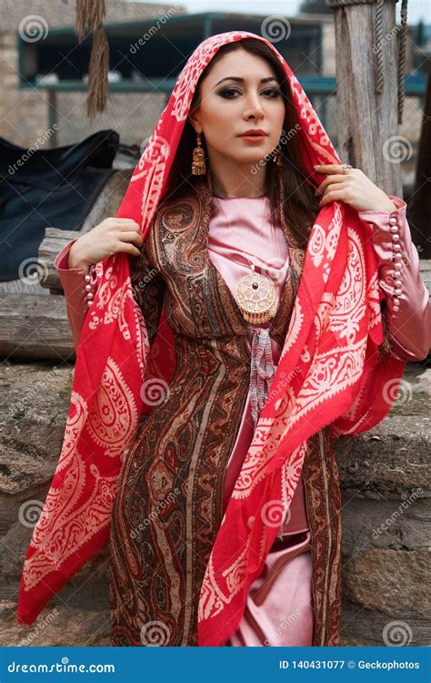 Beautiful Middle Eastern Women Wearing Traditional Dress, Posing ...