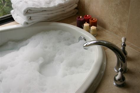 Bubble Bath With Candles Towels Stock Photo - Download Image Now - iStock