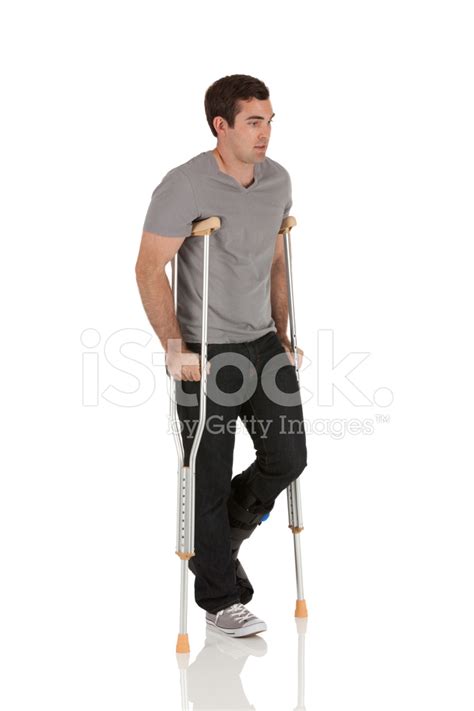 Injured Young Man On Crutches Stock Photo | Royalty-Free | FreeImages