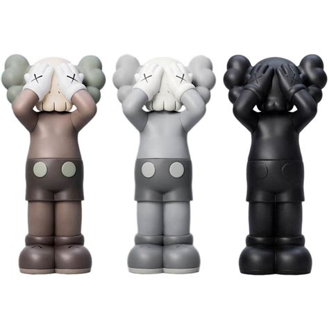 KAWS - Holiday UK - Lucky Cat Gallery